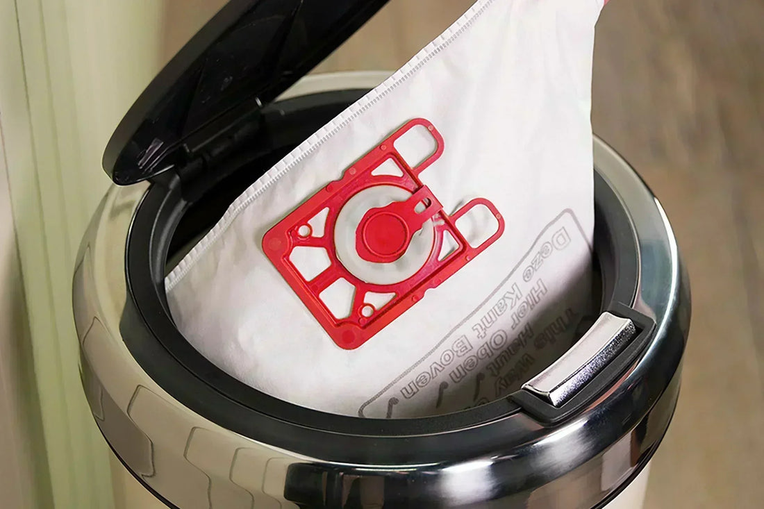 Dust-free disposal of a bagged HEPA-Flo filter in the trash bin 